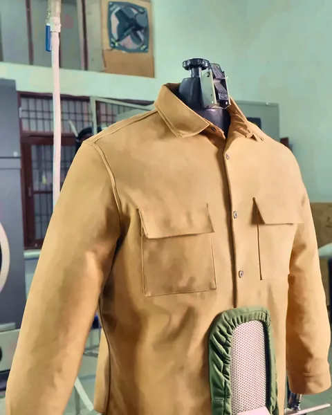 Jacket shaped on a steam form finisher at Swan Clean