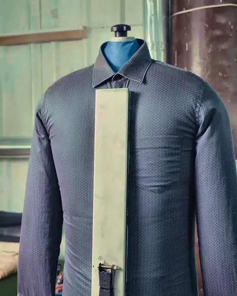 Shirt pressed on a form finisher for a crisp finish